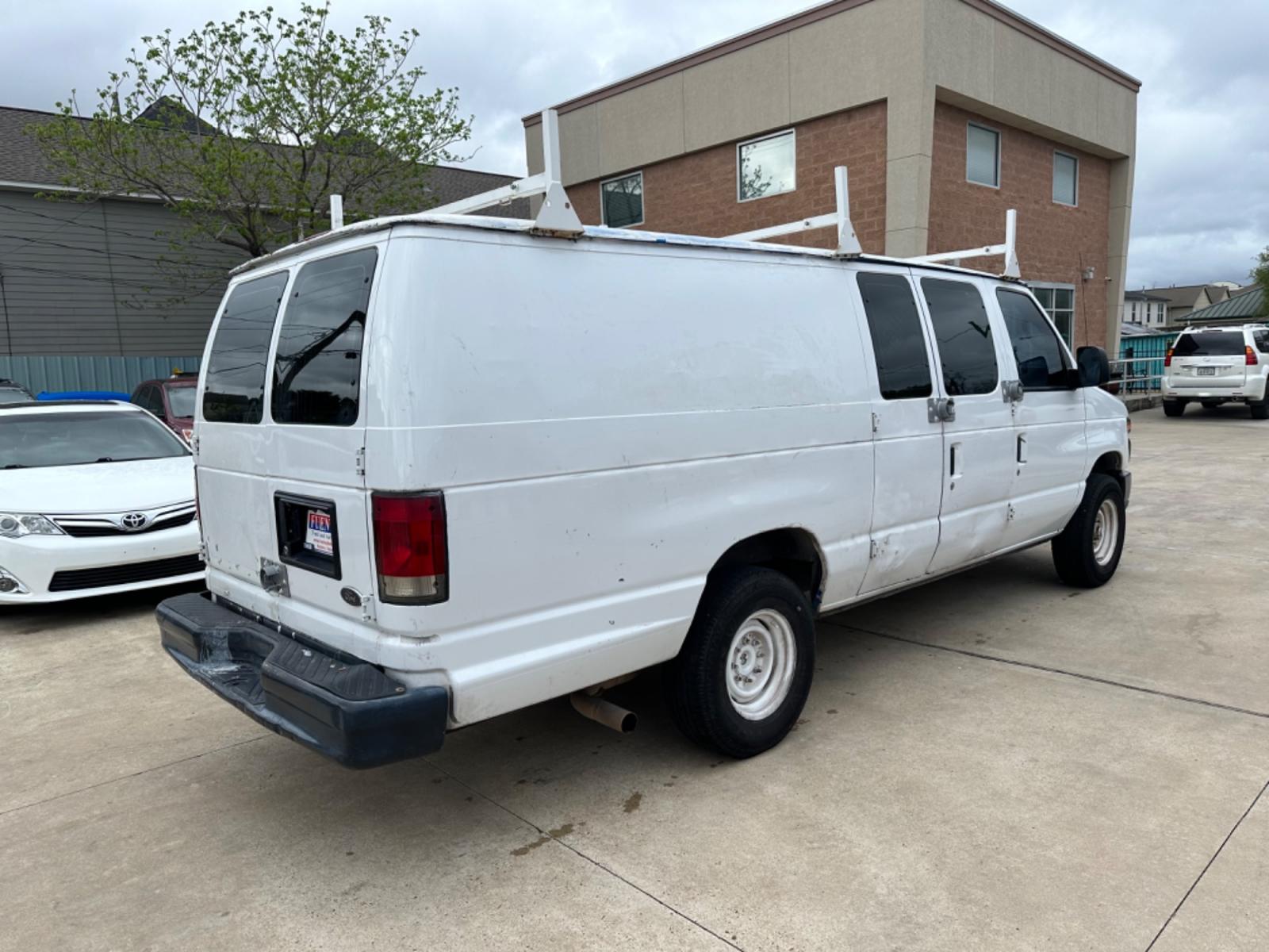 2014 White /Gray Ford E-Series Van E-350 Super Duty Extended (1FTSS3EL5ED) with an 5.4L V8 SOHC 16V FFV engine, 6-Speed Automatic transmission, located at 1501 West 15th St., Houston, 77008, (713) 869-2925, 29.797941, -95.411789 - Photo #2